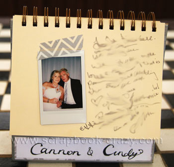 instax polaroid photo in a hand made wedding guestbook.